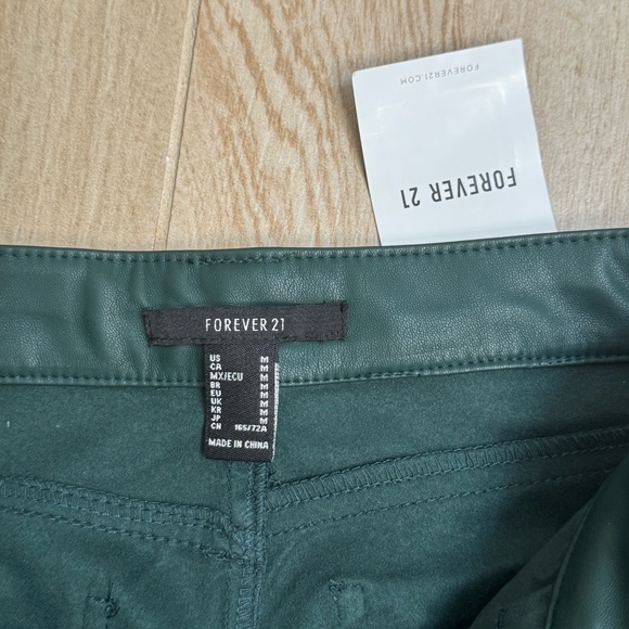 Forever 21 Dark Green Faux Leather Green Pants NWT Bootcut Size Medium Regular - Picture 5 of 13
